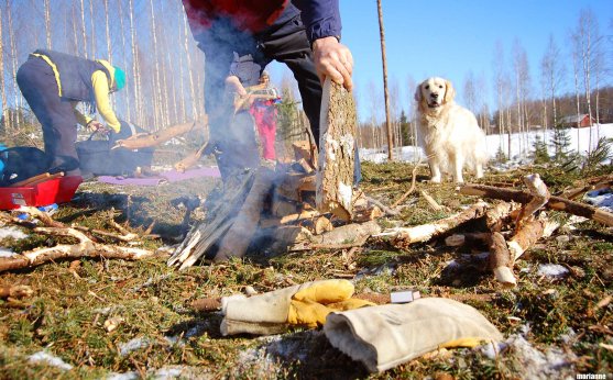 forest-trip-grandfather-making-campfire