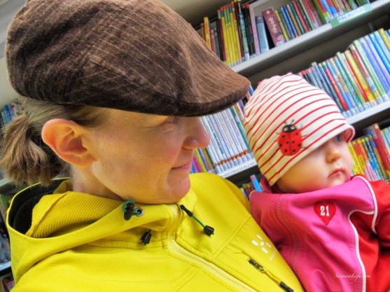 mother-and-children-visiting-library-car-1