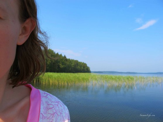 woman-having-morning-coffee-by-lake-3