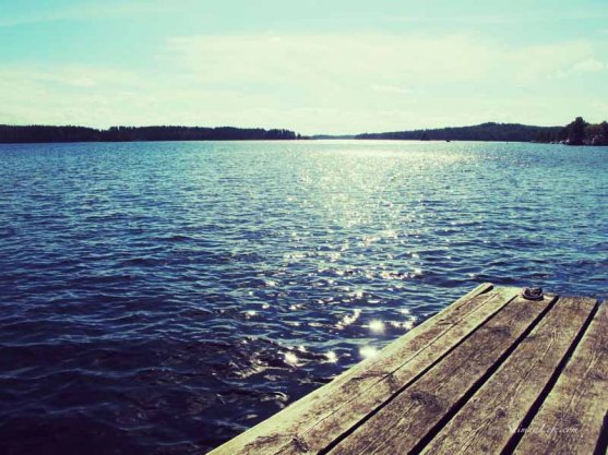 woman-eating-ice-cream-by-lake-2