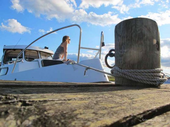 woman-sunbathing-on-boat-1
