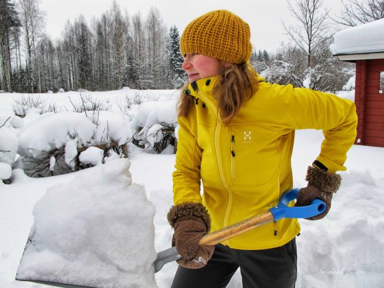 woman-snow-clearing