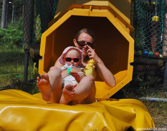 mom-and-daughter-sliding-together