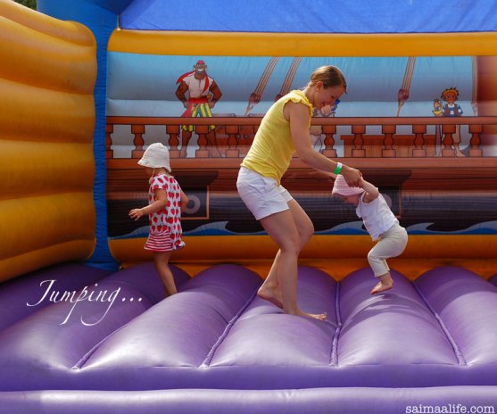 mother-and-daughters-jumping-together