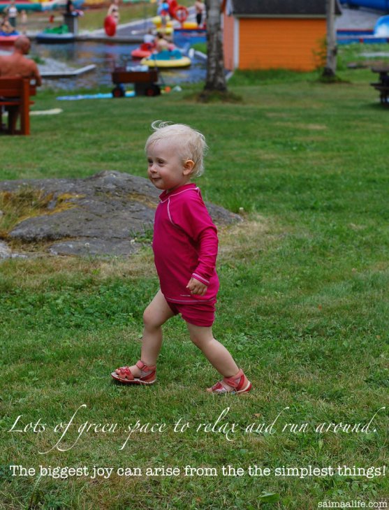 small-child-running-in-green-lawn