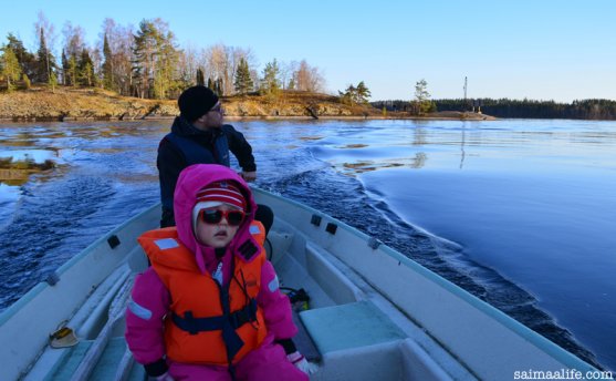 father-and-child-in-boat-on-lake