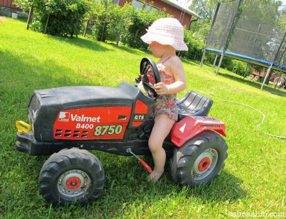 child-playing-with-childrens-tractor