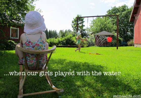 children-playing-in-garden-with-water