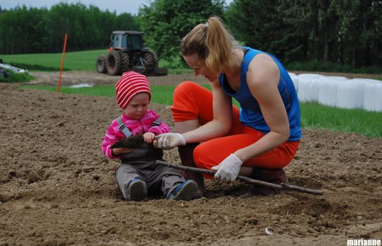 mother-and-daughter-in-vegetable-garden