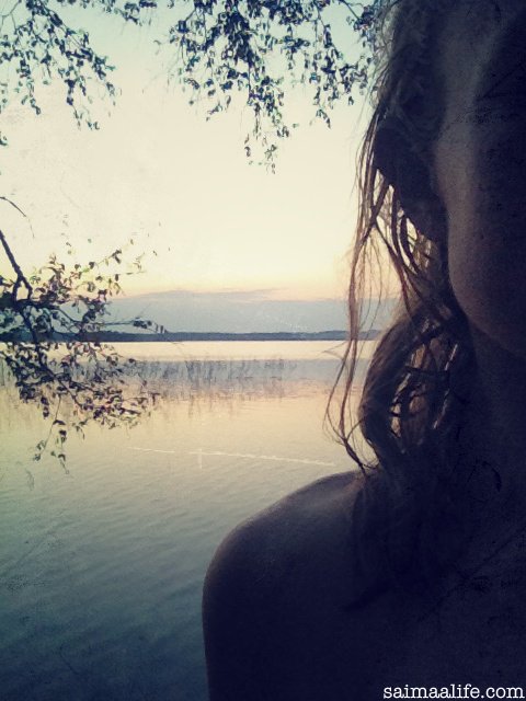 woman-after-having-lakeside-sauna