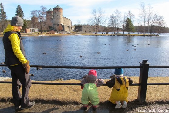 mother-and-children-outside-together-in-finland