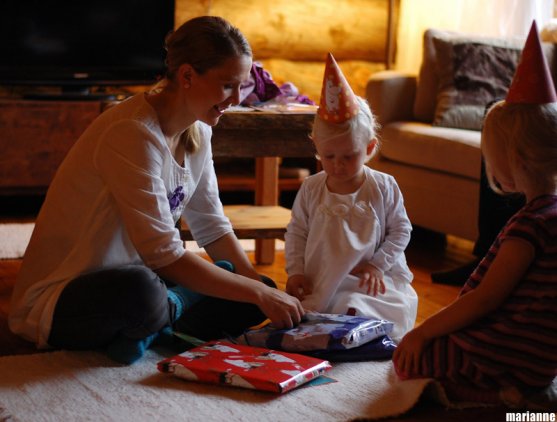 mother-and-child-opening-presents