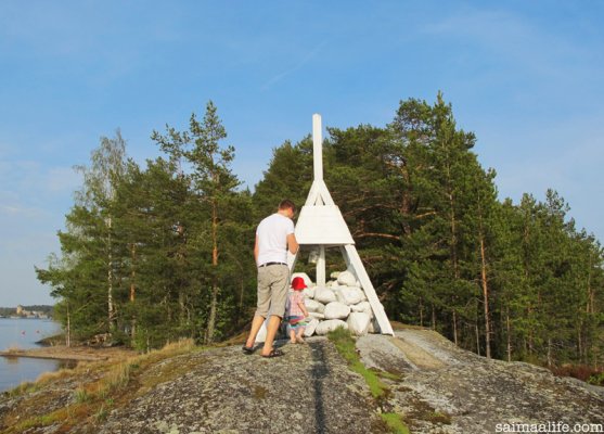 father-and-child-on-island-in-savonlinna-near-olavinlinna-castle