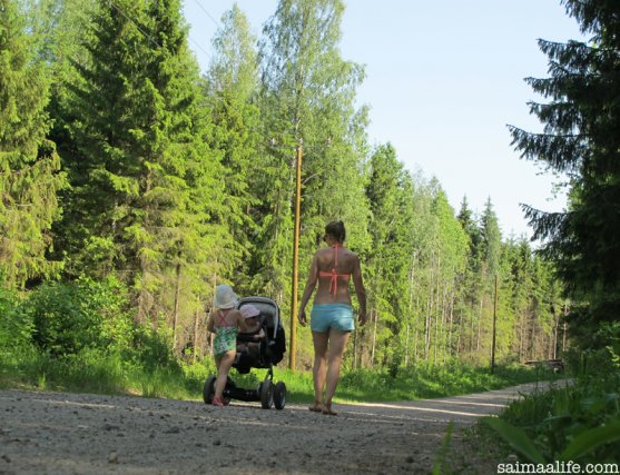 mother-and-children-walking-in-countryside