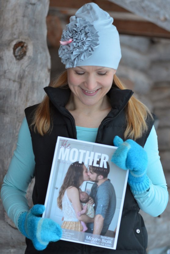 mother-holding-the-mother-magazine-in-her-hands