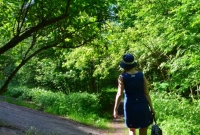 8-woman-walking-in-nature-path