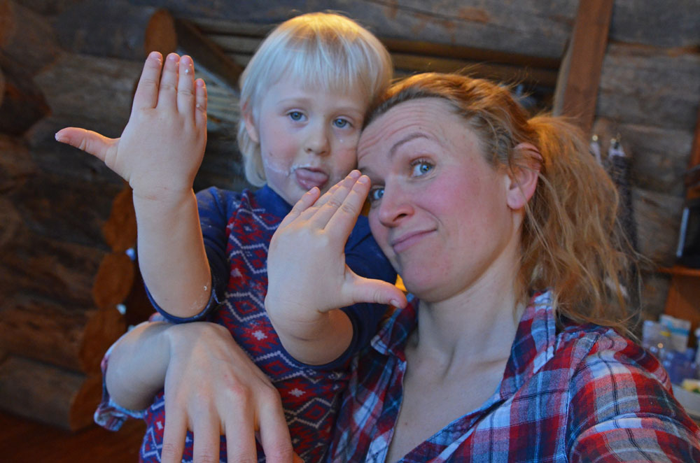 mother and child dancing and baking