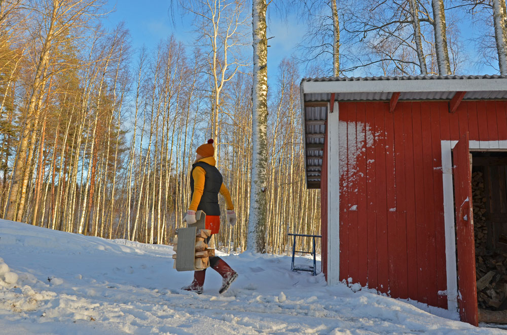 natural-rhythm-woman-carrying-firewood