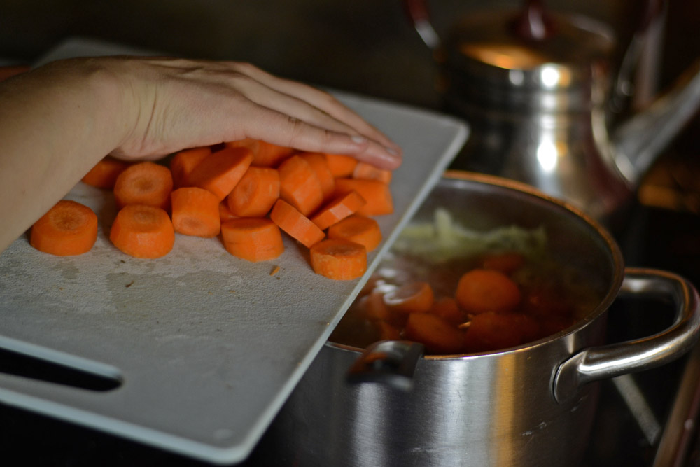 mother-making-vegetable-soup