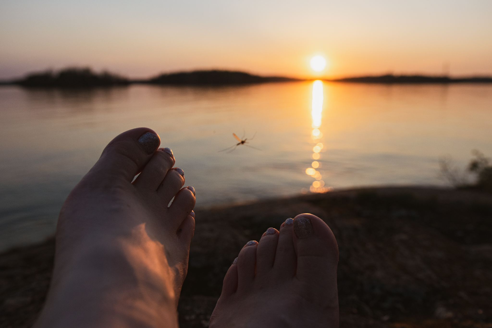 Peaceful sunset moment by the lake in Saimaa Finland