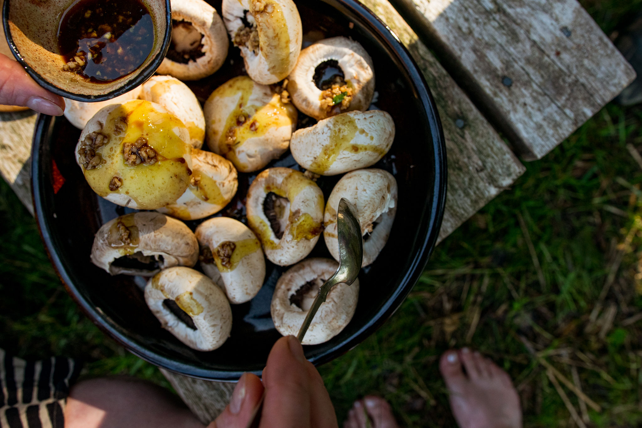 marinating the saimaalife grilled mushroom skewers