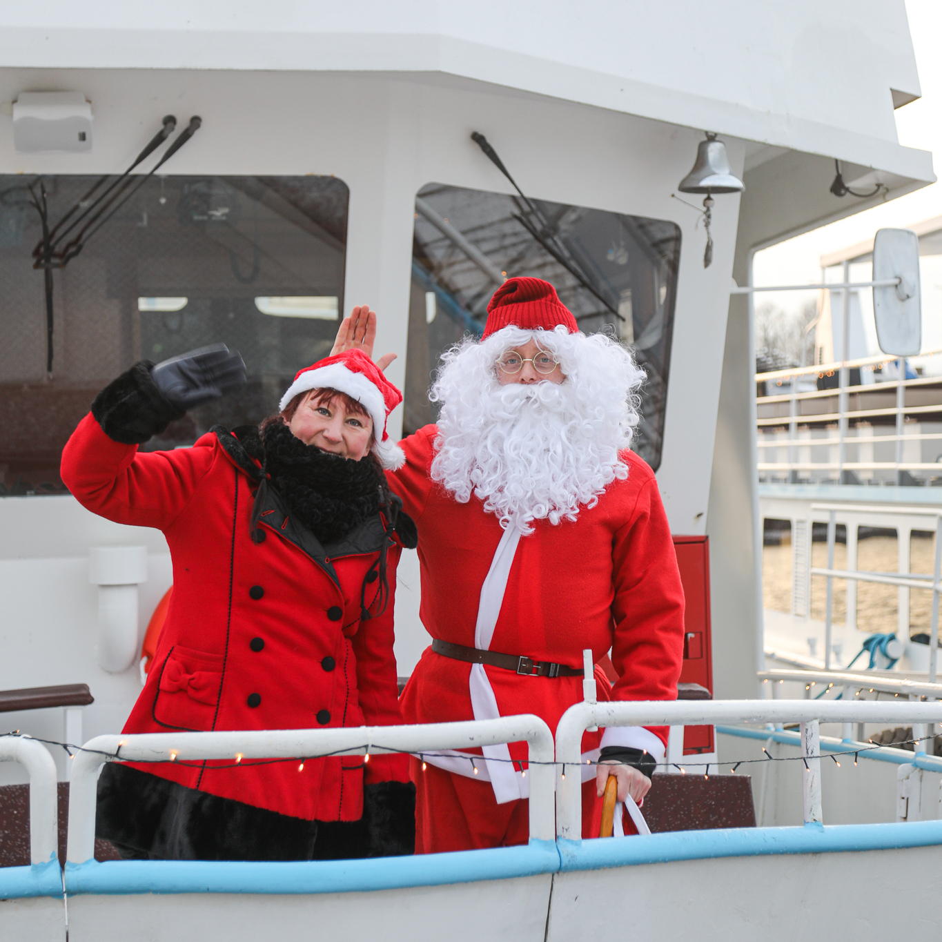 Captain Piia Kinnunen from Savonlinna Cruises wishing Merry Christmas with Santa Claus in Saimaa, Finland