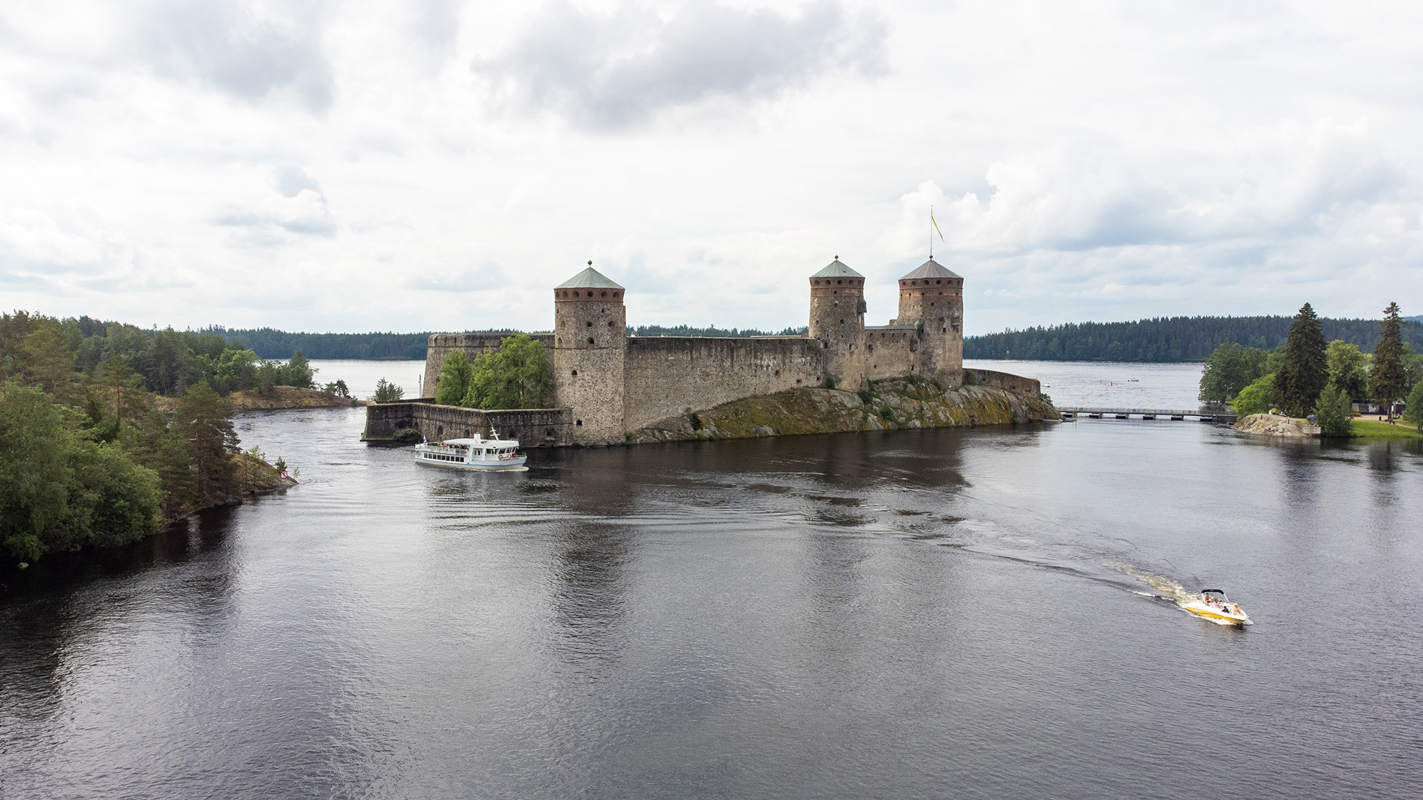 Savonlinna City Sightseeing Cruise passing Olavinlinna castle